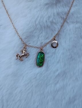 2/$10 August Girl Gold Necklace with Peridot Green Iridescent Stone and Charms